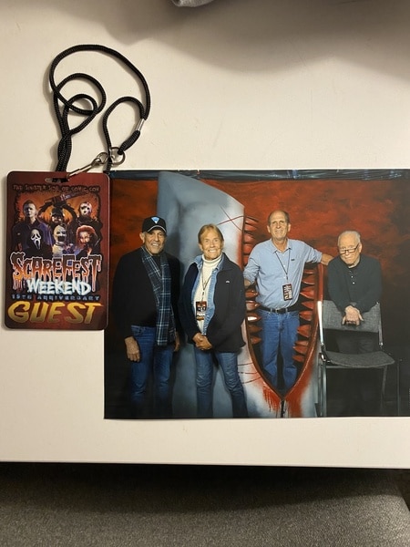 A guest pass and Jaws cast members.