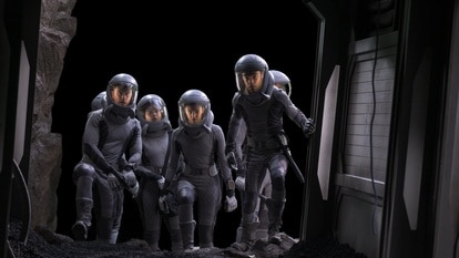 The cast wears full body spacesuits on The Ark Episode 206.