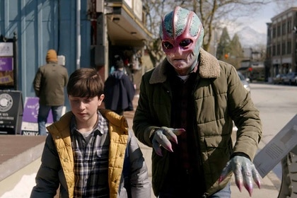 Max Hawthorne and Alien Harry walk together on Resident Alien Season 3 Episode 7.